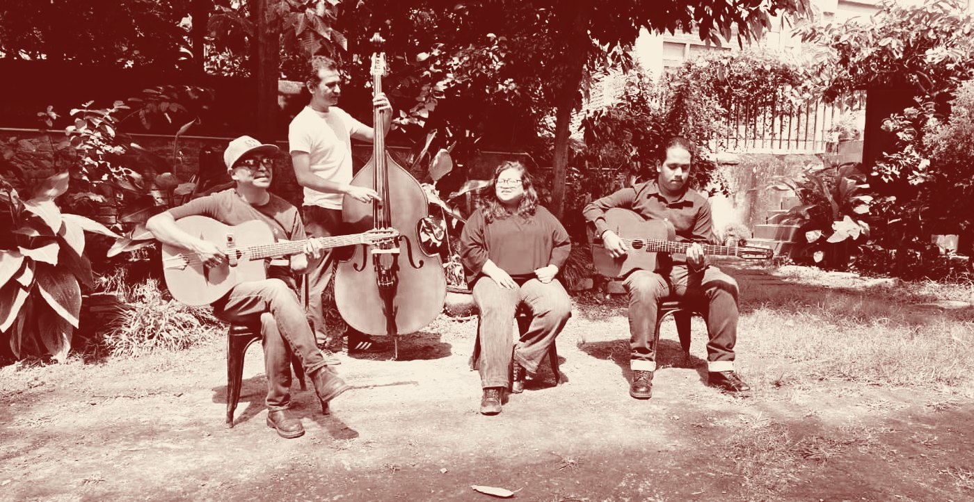 The Hot Club of Patan — four musicians with guitars and double bass